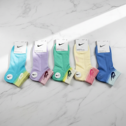Calcetines Nike pastel flat lay mármol
